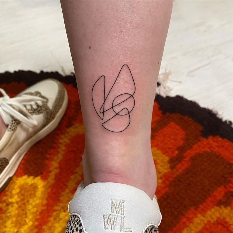 Abstract shapes ankle tattoo