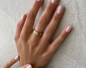 Close up of hands with a minimal mani