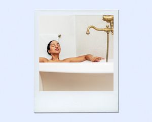 woman sitting in bath