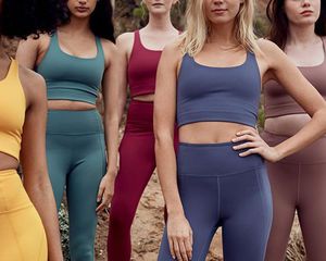 women in colorful workout clothes