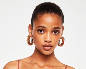 woman with large earrings