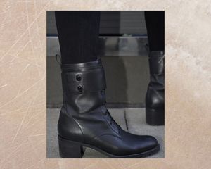 Kendall Miles combat boots on sidewalk