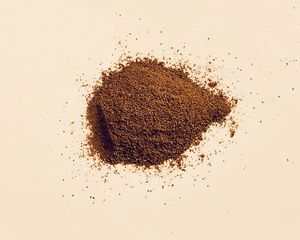 A pile of cinnamon powder.