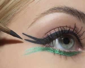 Person applying floating eyeliner