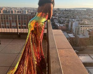Phoebe Robinson in a sequin gown at sunset