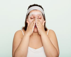 woman washing face