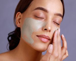 woman washing face