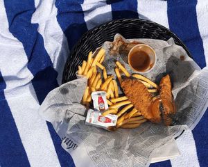 chicken tenders on blue striped towel