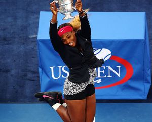 Serena Williams holding a trophy