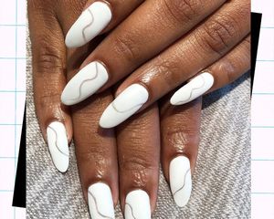 woman with short almond nails