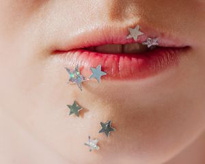 stars on woman's face