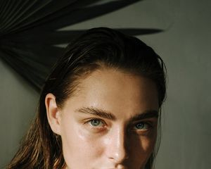 Woman with blue eyes and bold eyebrows