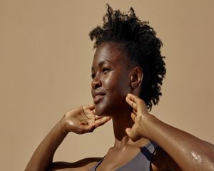 Black woman with acne skin