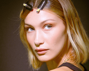 Bella Hadid with blonde hair and hair clips