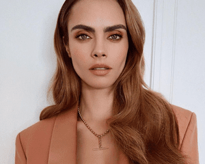 Cara Delevingne with long light brown hair